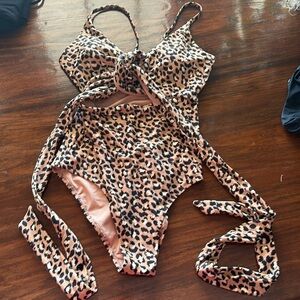 NWT Aerie one piece bathing suit with tie that goes around back and front. Sexy.